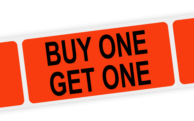 A florescent-red adhesive label with the words 'Buy One, Get One' on it
