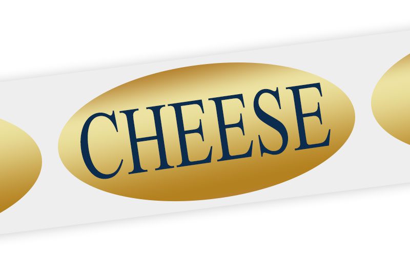 An oval, gold-gloss label with the word 'Cheese' in it