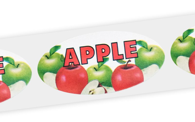A white oval label with the word 'Apples' on it and images of various apples in the background